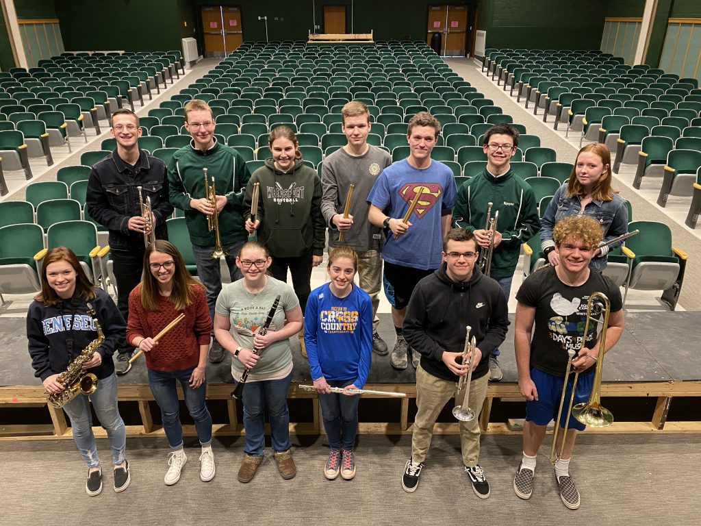 the 13 members of the all county band pose for the camera