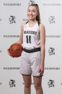 2021 Sarah Carroll poses for Weedsport Varsity Basketball team photo