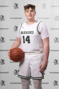 2021 Thomas Sickler poses for Weedsport Varsity Basketball team photo