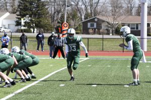 Ashton Benedict plays football