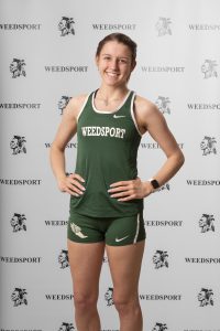 Breanna Roof poses for her track team photo