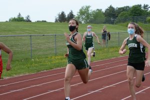 Suzie Nemec competes in a track meet