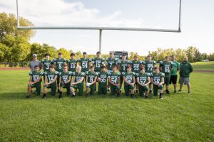 The varsity football team is honored as a scholar-athlete team