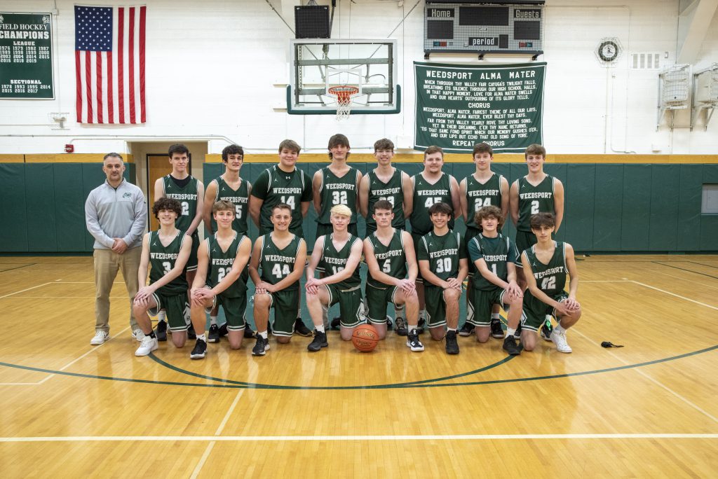 Boys varsity basketball team wins Patriot League title for the 2021-22 season