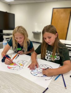 Weedsport students work on art projects during the 2022 Summer Art Camp at Weedsport Elementary