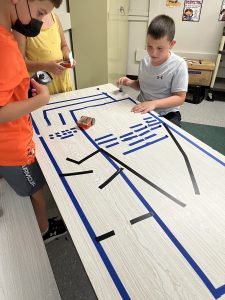 Students work on their math and science skills during STEM camp at Weedsport Elementary