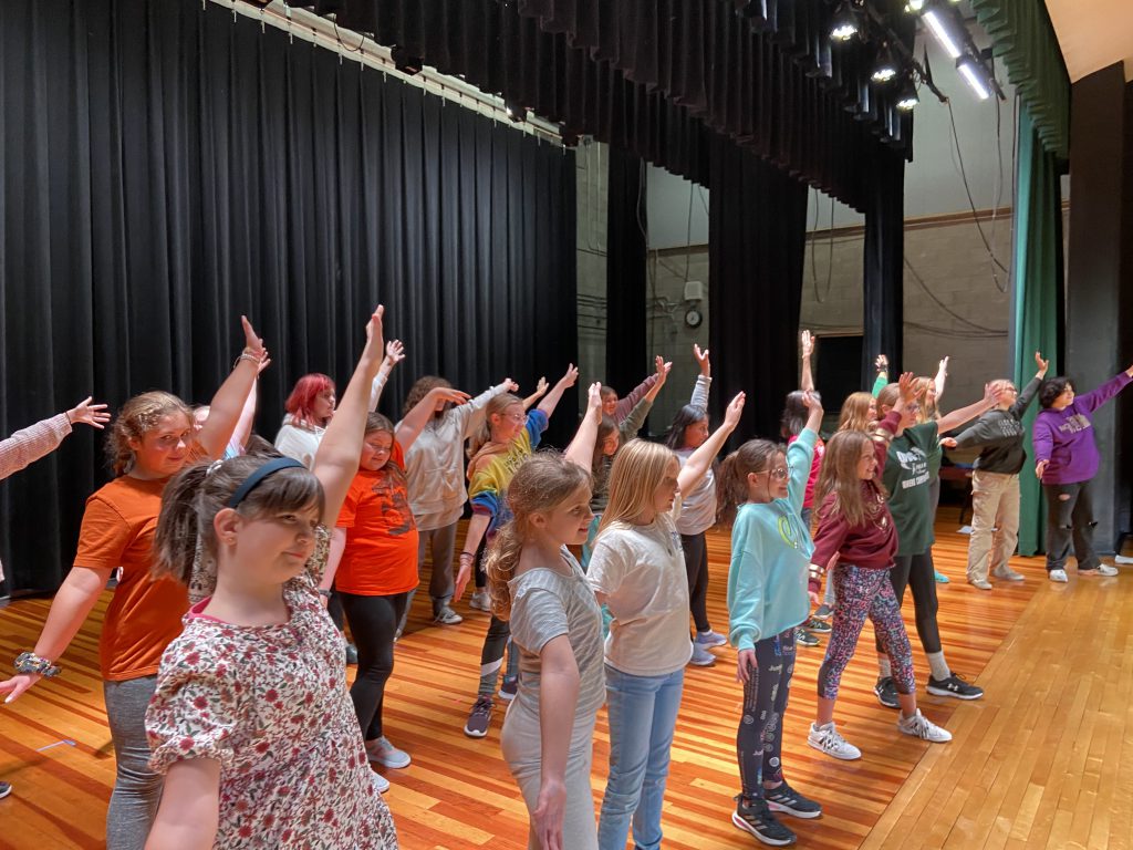 Students rehearse the 2022 middle school musical, Rudloph the Red-Nosed Reindeer