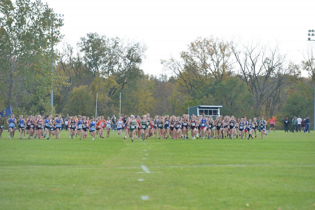 cross country runners compete in the Weedsport Invitational
