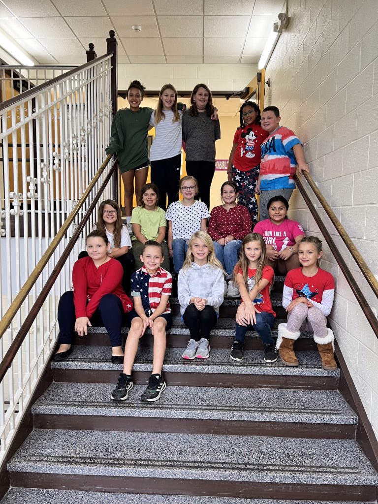 4th and 5th grade students who won ESGO elections pose for a photo