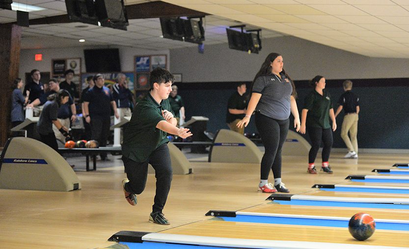 A Weedsport student bowls during a 2022 match