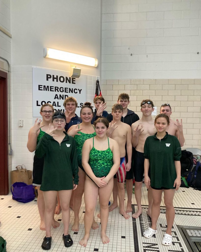 The Weedsport swim team poses for a team photo.