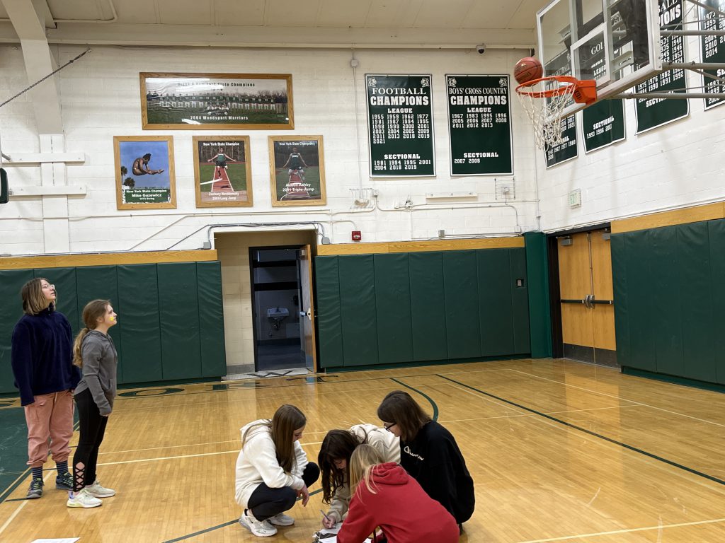 Sixth grade students participate in a Free Throw STEM Challenge in the Jr.-Sr. High School gymnasium.