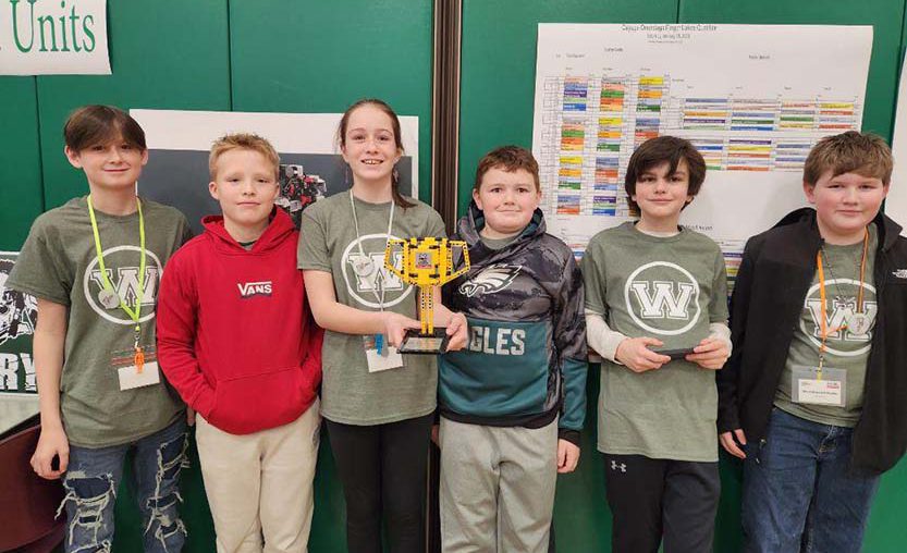 Weedsport's Lego League team poses for a photo at a competition.