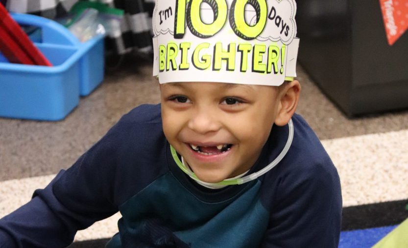 Student laughing during 100 Days of School activity